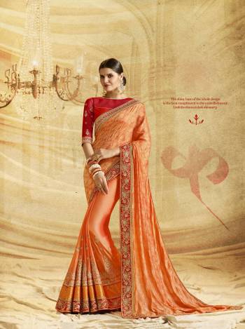 Orange And Red Color Induces Perfect Summery Appeal To Any Outfit, So Grab This Saree In Orange Color Paired With Contrasting Red Colored Blouse. This Saree Is Fabricated On Banarasi Silk And Satin Silk Paired With Art Silk Fabricated Blouse. Buy This Beautiful Saree Now.