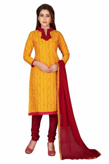 For Your Casual wear, Grab This Dress Material In Musturd Yellow Colored Top Paired With Contrasting Maroon Colored Bottom And Dupatta. Its Top Is Fabriacated On Chanderi Cotton Paired With Santoon Bottom And Chiffon Dupatta. Its All Three Fabrics Ensures Superb Comfort All Day Long.