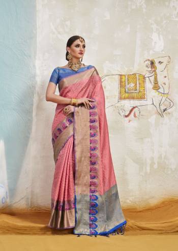 Look Prettiest Of All Wearing This Saree In Pink Color Paired With Contrasting Blue Colored Blouse. This Saree And Blouse Are Fabricated On Art Silk Beautified With Weave. This Pretty Saree Will Definitely Ear You Lots Of Compliments From Onlookers.