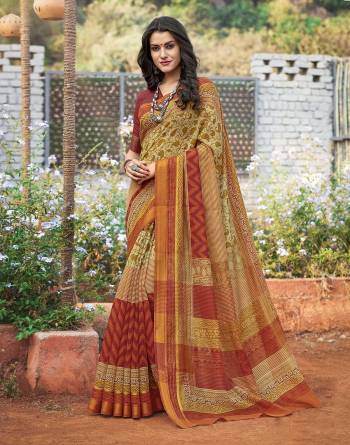 Grab This Saree In Multi Color Paired With Rust Colored Blouse. This Saree And Blouse Are Fabricated On Cotton Silk Beautified With Multi Prints. It Is Easy To Drape, Durable And Easy To Care For.