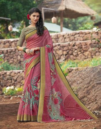 This Pretty Saree Will Definitely Earn You Lots Of Compliments From Onlookers, Buy This Very Pretty Pink Colored Saree Paired With Contrasting Green Colored Blouse. This Saree And Blouse Are Fabricated On Cotton Silk Beautified With Prints.