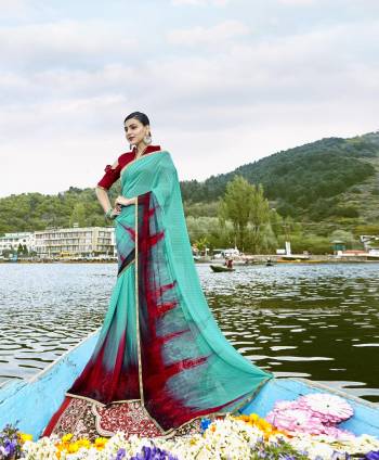 Here Is Very Pretty Shade In Green With This Saree In Sea Green Color Paired With Contrasting Maroon Colored Blouse. This Saree Has Weightless Fabric Paired With Art Silk Fabricated Blouse.  You can Wear This Saree As Semi-Casual Or Casual Wear.