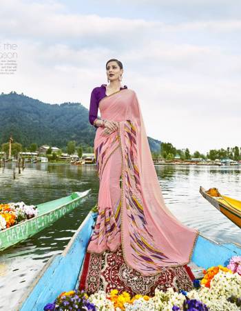 Look Pretty In This Lovely Baby Pink Colored Saree Paired With Contrasting Purple Colored Blouse. This Saree Has Weightless Fabric Paired With Art Silk Fabricated Blouse. It Has Pretty Prints Over The Saree And This Beautiful Combination Will earn You Lots Of Compliments From Onlookers. 