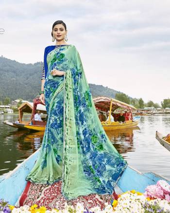 Here Is Very Pretty Shade In Green With This Saree In Sea Green And Blue Color Paired With Blue Colored Blouse. This Saree Has Weightless Fabric Paired With Art Silk Fabricated Blouse.  You can Wear This Saree As Semi-Casual Or Casual Wear.