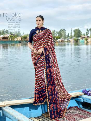 All Over Prints Is In Trend This Summer, Grab This Pretty Saree In Multi Color Paired With dark Blue Colored Blouse. This Saree Is Fabricated On Weightless Fabric Paired With Art Silk Fabricated Blouse. Buy This Fully Printed Saree Now.