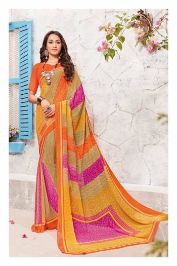 Go Colorful With This Multi Colored Saree Paired With Contrasting Orange Colored Blouse. This Saree And Blouse Are Fabricated On Georgette Beautified With Simple Prints. It Is Light Weight And Ensures Superb Comfort All Day Long. Buy Now.