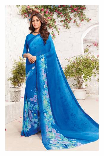 Cool Color Shades Are Best For Summers, So Grab This Saree In Blue Color Paired With Blue Colored Blouse. This Saree and Blouse Are Fabricated On Georgette Which Is Light Weight And Ensures Superb Comfort All Day Long.