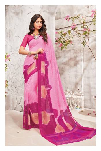 Every Womens Favourite Color Is Here With This Saree In Light Pink Color Paired With Magenta Pink Colored Blouse. This Saree And Blouse Are Fabricated On Georgette Beautified With Simple Minimal Prints. 