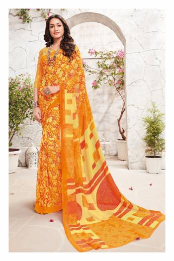 Here Is A Shaded Saree In Yellow Color Paired With Yellow Colored Blouse. This Saree And Blouse Are Fabricated On Georgette Beautified With Contrasting Colored Floral Prints All Over It.