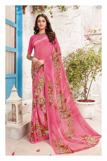 You Will Definitely Earn Lots Of Compliments Wearing This Saree In Pink Color Paired With Pink Colored Blouse. This saree And Blouse Are Fabricated On Georgette Beautified With Prints. Buy This Saree Now.