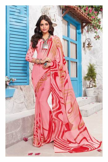 Look Pretty In This Lovely Saree In Bany Pink Color Paired With Baby Pink Colored Blouse. This Saree And Blouse Are Fabricated On Georgette Beautified With Prints All Over It.