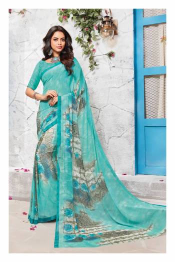 Perfect Summery Shades Are Here With This Beautiful Saree In Light Blue Color Paired With Light Blue Colored Blouse, This Saree And Blouse Are Fabricated On Georgette Which Is Light Weight, Easy To Drape and Carry All Day Long.