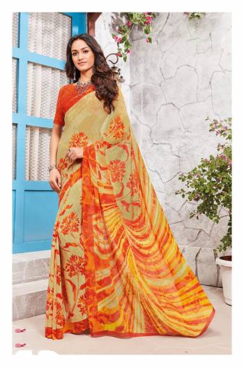 Bright And Traditional Colors Are Here With This Saree In Yellow Color Paired With Contrasting Orange Colored Blouse. This Saree And Blouse Are Fabricated On Georgette Beautified With Floral Prints. Buy This Saree Now.