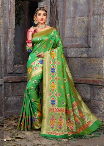 Silk Gives A Rich And Elegant Look To Your Personality, So Grab This Silk Saree In Green Color Paired With Contrasting Pink Colored Blouse. This Saree And Blouse Are Fabricated On Art Silk Beautified With Weave. It Is Light Weight, Easy to Carry And Durable.