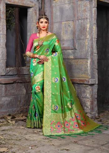 Silk Gives A Rich And Elegant Look To Your Personality, So Grab This Silk Saree In Green Color Paired With Contrasting Pink Colored Blouse. This Saree And Blouse Are Fabricated On Art Silk Beautified With Weave. It Is Light Weight, Easy to Carry And Durable.