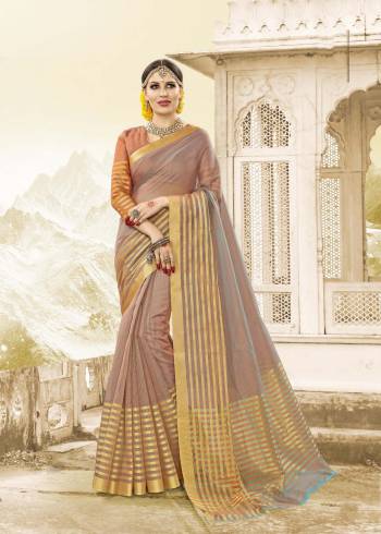 You Will Definitely Eanr Lots Of Compliments Wearing This Pretty Saree In Grey Peach Color Paired With Peach Colored Blouse. This Saree And Blouse Are Fabricated On Handloom Cotton Silk. It Is Light In Weight And Easy To Carry All Day Long.