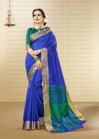 Shine Bright Wearing This Saree In Royal Blue Color Paired With Contrasting Dark Green Colored Blouse. This Saree and Blouse Are Fabricated On Handloom Cotton Silk Which Is Light Weight And Easy To Carry All Day Long.