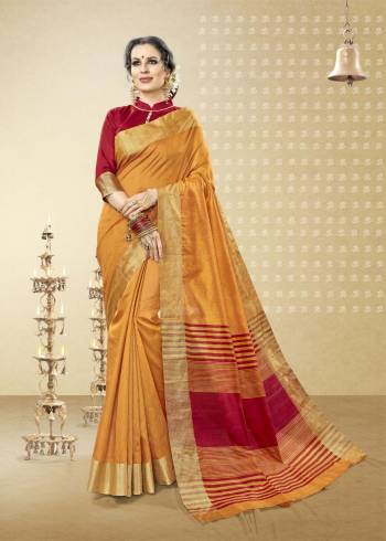 Bright And Visually Appealing Color Is Here With This Saree In Orange Color Paired With Contrasting Maroon Colored Blouse. This Saree and Blouse Are Fabricated On Handloom Cotton Silk. It Is Easy To Carry And Durable.