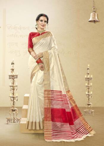 Flaunt Your Rich And Elegant Taste Wearing This Saree In Cream Color Paired With Red Colored Blouse. This Saree And Blouse Are Fabricated On Handloom Cotton Silk Which Is Durable And Easy To Care For.