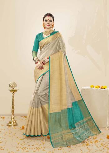 Look Elegant Wearing This Saree In Pale Grey Color Paired With Contrasting Turquoise Blue Colored Blouse. This Saree and Blouse Are Fabricated On Cotton Handloom Silk Which Is Easy To drape And Easy To Care For.