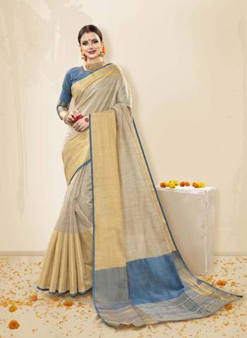 For Youe Semi-Casuals Or Festive Wear, This Saree Is Suitable For All, Grab This Saree In Pale Grey color Paired With Steel Blue Colored Blouse. This Saree And Blouse Are Fabricated On Cotton Handloom Silk Which Is Durable And Easy To care For.