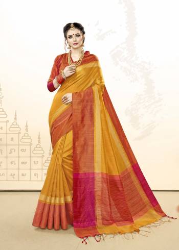 Celebrate This Festive Season With Traditional Colors With This Saree In Musturd Yellow Color Paired With Contrasting Orange Colored Blouse. This Saree And Blouse Are Fabricated On Khadi Cotton Silk.  Buy This Saree Now.