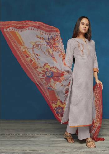 Flaunt Your Rich Ans Elegant Taste Wearing This Designer Straight Cut Suit In Grey Color Paired With Grey Colored Bottom And Multi Colored Dupatta. Its Top Is Fabricated On Satin Jacquard Paired With Cotton Bottom And Chiffon Dupatta. Its Rich Color And Fabric Will Earn You Lots Of Compliments From Onlookers.