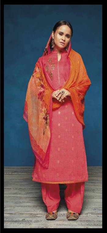 Add This Beauty To Your Wardrobe With This Designer Suit In Dark Pink Color Paired With Dark Pink Colored Bottom And Contrasting Orange Colored Dupatta. Its Top Is Fabricated On Satin Jacquard Paired With Cotton Bottom And Chiffon Dupatta. It Has Beautiful Prints And Elegant Embroidery. Buy Now.