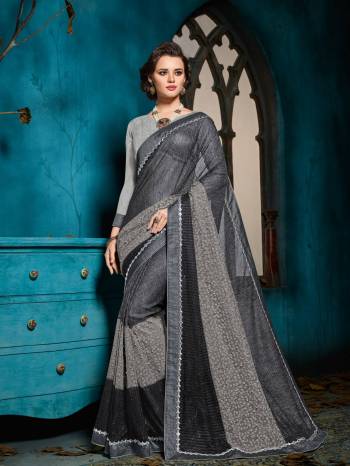 Flaunt a new ethnic look wearing this Grey color imported glitter lycra with net heavy work with jacquard border saree. this party wear saree won't fail to impress everyone around you. this gorgeous saree featuring a beautiful mix of designs. Its attractive color and designer heavy embroidered design, moti, cut paste design, beautiful floral design work over the attire & contrast hemline adds to the look. Comes along with a contrast unstitched blouse.