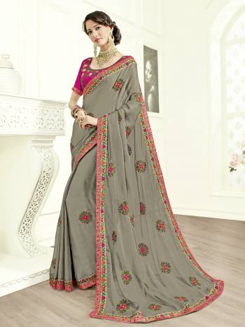 Grab this amazing saree and look pretty like never before. wearing this grey color two tone Chiffon silk and jacquard saree. this gorgeous saree featuring a beautiful mix of designs. look gorgeous at an upcoming any occasion wearing the saree. Its attractive color and designer heavy embroidered design, beautiful floral design work over the attire & contrast hemline adds to the look. Comes along with a contrast unstitched blouse.