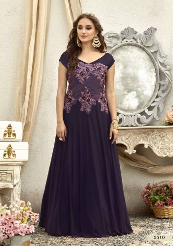 Get Ready For The Upcoming Wedding And Festive Season With This Designer Floor Length Gown In Purple Color Fabricated On Fancy Fabric. This Readymade Gown Is Soft Towards Skin And Easy To Carry Throughout The Gala.