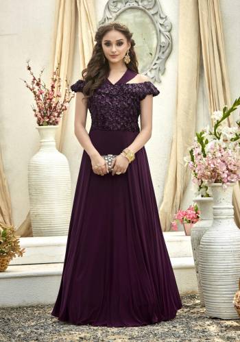 Earn Lots Of Compliments Wearing This Designer Floor Length Gown In Wine Color Fabricated On Fancy Fabric And Work. This Pretty Gown Is Light In Weight And Easy To Carry All Day Long.