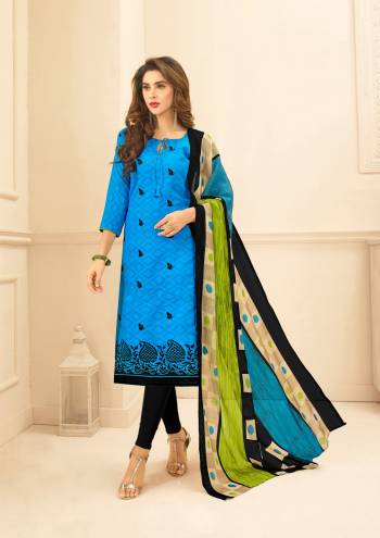 For Your Casual Wear, Grab This Pretty Straight Cut Suit In Blue Color Paired With Black Colored Bottom And Multi Colored Dupatta. Its Top Is Fabricated On Cotton Jacquard Paired With Cotton Bottom And Chiffon Dupatta. Buy This Dress Material Now.