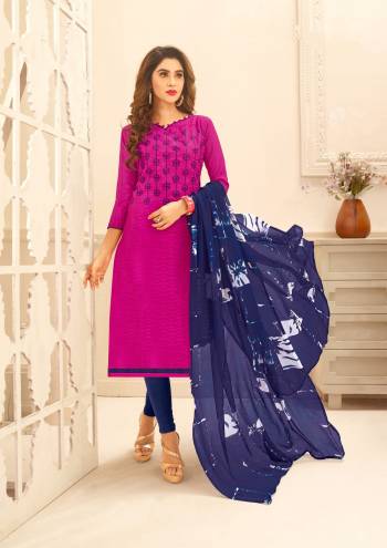 Add This Beautiful Dress Material To Your Wardrobe In Dark Pink Color Paired With Contrasting Navy Blue Colored Bottom And Dupatta. Its Top Is Fabricated On Cotton Jacquard Paired With Cotton Bottom And Chiffon Dupatta. This Suit Is Light In Weight And Easy To Carry All Day Long.