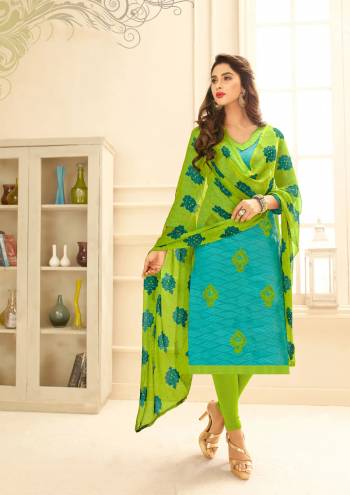 Shine Bright In This Straight Cut Suit In Turquoise Blue Colored Top Paired With Light Green Colored Bottom And Dupatta. Its Top Is Fabricated On Cotton Jacquard Paired With Cotton Bottom And Chiffon Dupatta. Buy This Dress Material Now.