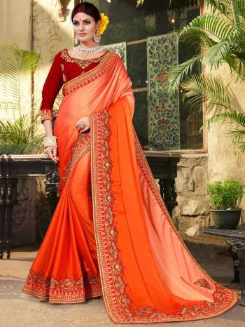 Shades Are In This Season, So Grab This Beautiful Designer Saree In Orange Color Paired With Contrasting Maroon Colored Blouse. This Saree Is Fabricated On Silk Georgette Paired With Art Silk Fabricated Blouse. This Saree Is Light In Weight And Easy To Carry Throughout The Gala.