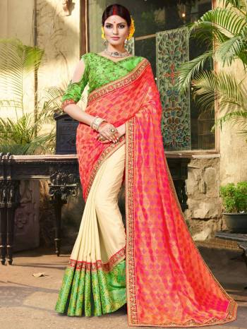 For A Proper Traditional Look, Grab This Saree In Pink And Cream Color Paired With Contrasting Green Colored Blouse. This Saree Is Fabricated On Jacquard Silk And Art Silk Paired With Art Silk Fabricated Blouse. This Saree Is Easy To Drape And Carry All Day Long. 