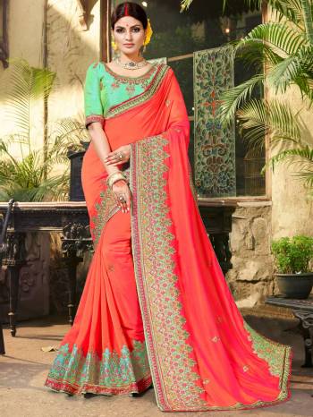 Bright And Visually Appealing Color Is Here With This Designer Saree In Dark Pink Color Paired With Contrasting Sea Green Colored Blouse. This Saree Is Fabricated On Silk Georgette Paired With Art Silk Fabricated Blouse. It Has Heavy Embroidery All Over The Saree And Blouse. Buy Now.