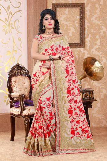 Flaunt Your Rich And Elegant Taste Wearing This Designer Saree In Beige Color Paired With Beige Colored Blouse. This Saree And Blouse Are Fabricated On Georgette Beautified With Heavy Embroidery All Over It. Buy This Saree Now.