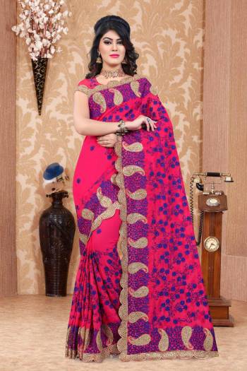 Look Attractive Of All Wearing This Designer Saree In Dark Pink Color Paired With Dark Pink Colored Blouse. This Saree And Blouse Are Fabricated On Georgette Beautified With Jari And Thread Work All Over It. This Saree Will Give You An Attractive Look Like Never Before.