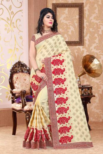 Celebrate This Festive Season Wearing this Designer Heavy Saree In Cream Color Paired With Cream Colored Blouse. This Saree And Blouse Are Fabricated On Georgette Beautified With Heavy Contrasting Embroidery All Over It.