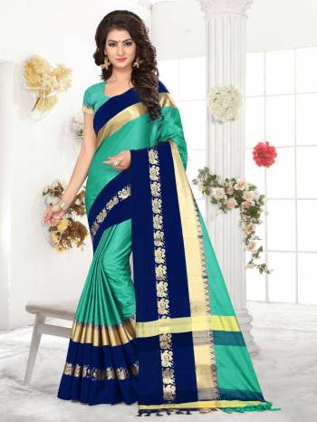 Here Is A Very Pretty Shade In Green With This Silk Saree In Sea Green Color Paired With Sea Green Colored Blouse. This Saree And Blouse Are Fabricated On Satin Silk. Its Fabric Enusres Superb Comfort All Day Long.