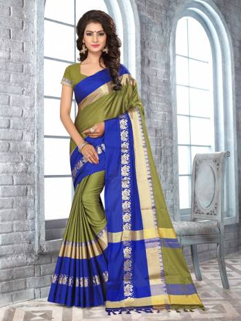 New And Unique Shade In Green Is Here With This Silk Saree In Olive Green Color Paired With Olive Green Colored Blouse. This Saree And Blouse Are Fabricated On Satin Silk Which Is Light In Weight And Easy To Carry All Day Long. 