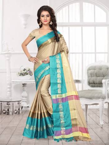 Flaunt Your Rich Elegant Taste Wearing This Saree In Cream Color Paired With Cream Colored Blouse. This Saree And Blouse Are Fabricated On Satin Silk Beautified With Weave. This Saree Is Light In Weight And Easy To Carry All Day Long.