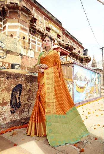 Add This Beautiful Traditonal Look Saree In Musturd Yellow Color Paired With Contrasting Light Green Colored Blouse. This Saree And Blouse Are Fabricated On Banarasi Art Silk Beautified With Weave All Over. Buy Now.