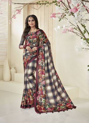 Go Colorful Wearing This Saree In Multi Color Paired With Multi Colored Blouse. This Saree And Blouse Are Fabricated On Cotton Khadi Beautified With Checks And Floral Prints All Over It. Buy Now.