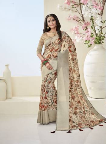 Grab This Beautiful Saree In Beige Color Paired With Beige Colored Blouse. This Saree And Blouse Are Fabricated On Cotton Khadi Beautified With Floral Prints All Over It. This Saree Is Light In Weight And Easy To Carry All Day Long. Buy Now.