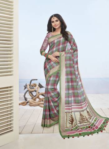 Go Colorful Wearing This Saree In Multi Color Paired With Mauve Colored Blouse. This Saree And Blouse Are Fabricated On Cotton Khadi Beautified With Checks Prints All Over It. Buy Now.