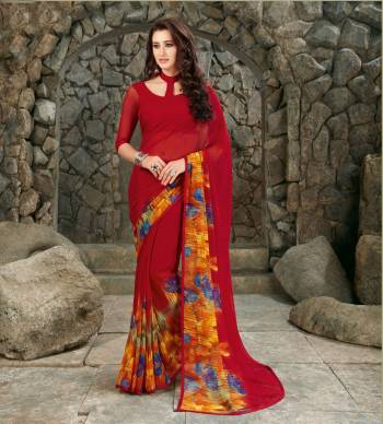 Adorn The Pretty Angelic Look Wearing This Saree In Red Color Paired With Red Colored Blouse, This Saree And Blouse Are Fabricated On Georgette Beautified With Floral Prints Over The Border.