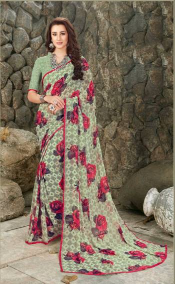 Very Pretty Shade In Green Is Here With This Saree In Mint Green Color Paired With Mint Green Colored Blouse. This Saree And Blouse Are Fabricated On Georgette Beautified With Bold Floral Prints All Over. 